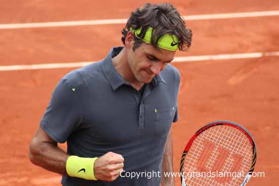 Federer fist pump (taken at Roland Garros in 2012)