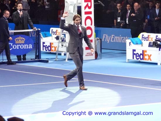 A wave from Rafa while leaving the court