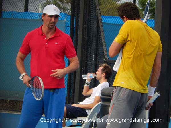 Cilic practicing with Goran with Benneteau on the sidelines