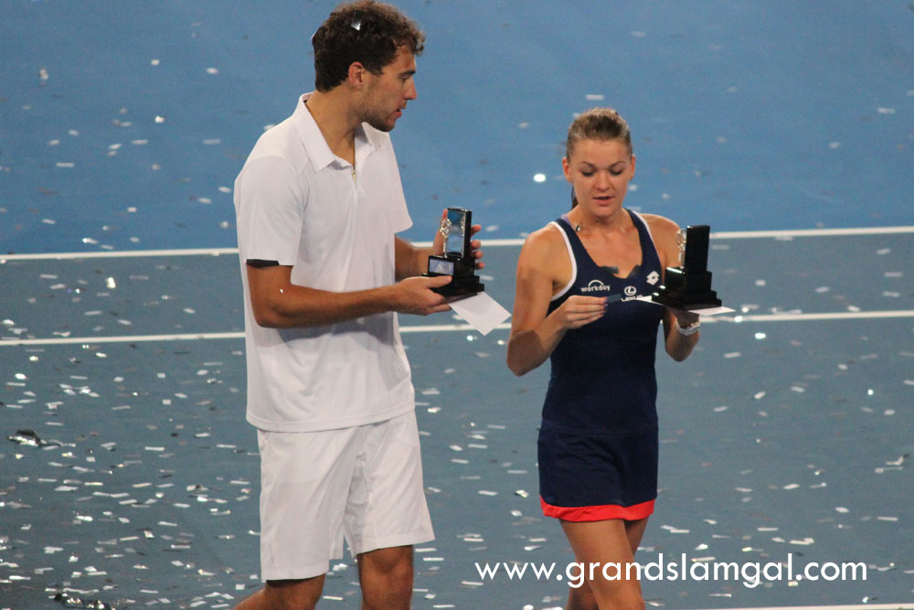 Aga and Jerzy with their diamond encrusted mini tennis racquets