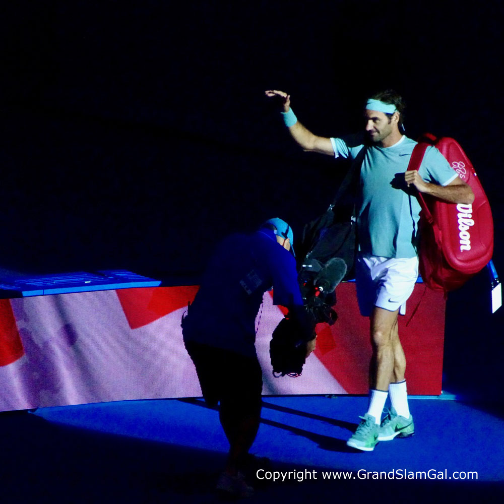 Federer entering the court to play Gasquet